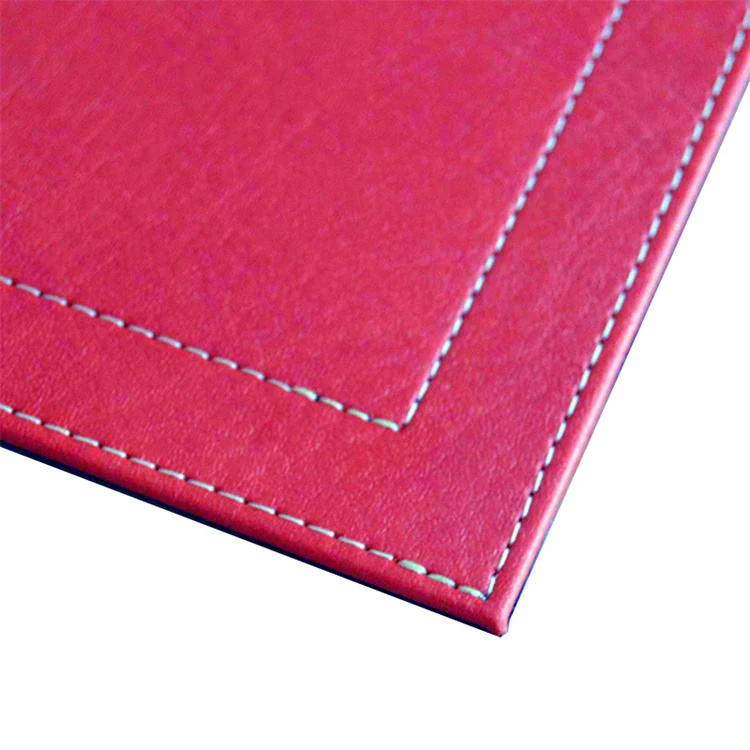 Table laid with leather placemats and coasters
