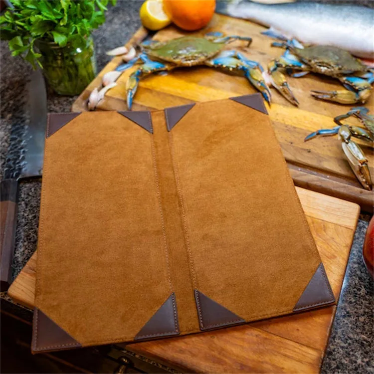 Reinforced corner detail on the leather menu cover