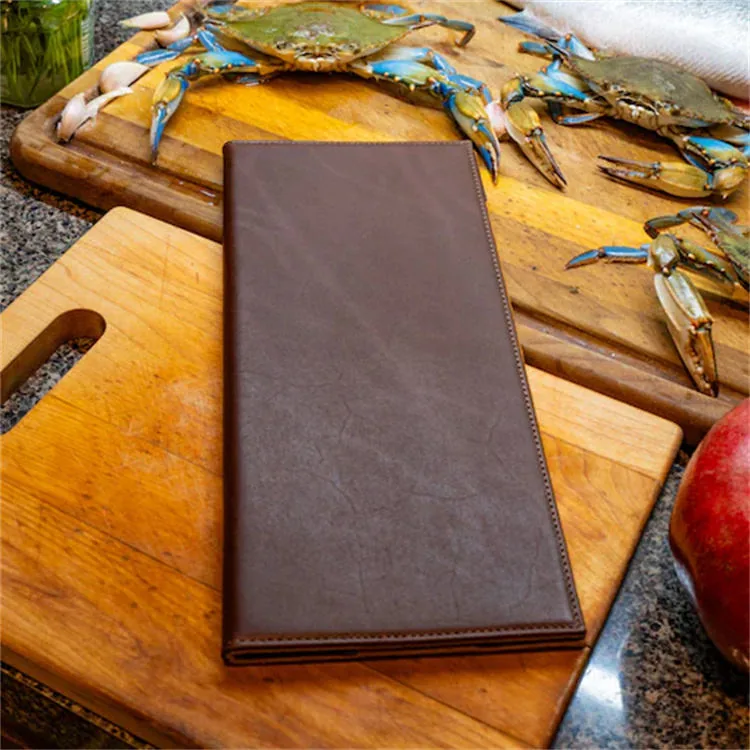Menu holder open showing the suede lining and menu page