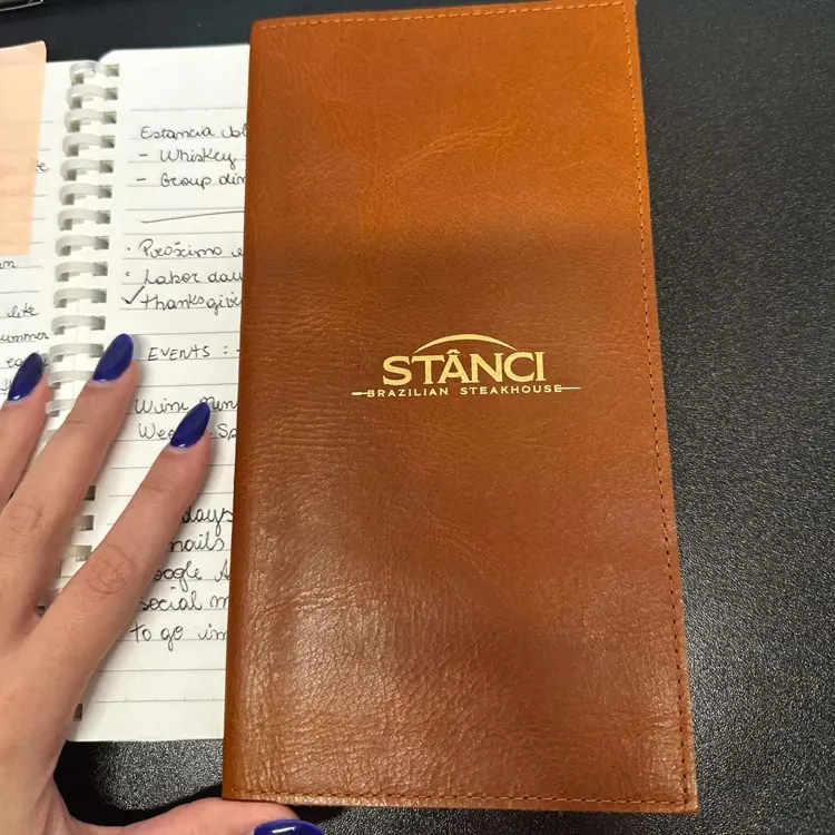 Close-up of embossed branding on the leather cover