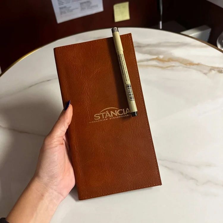 Stitched edge detail on the full-grain leather cover