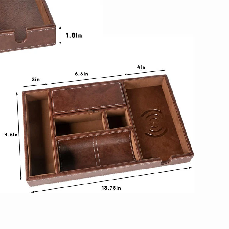 Close-up of the stitched leather edge and small item wells