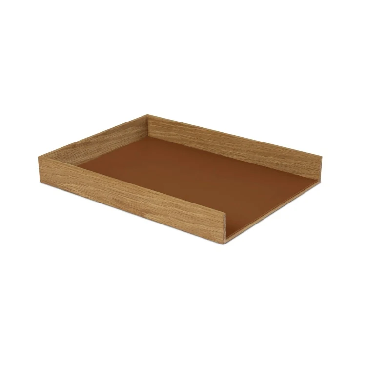 Brown leather-wrapped MDF desk tray on an office desk