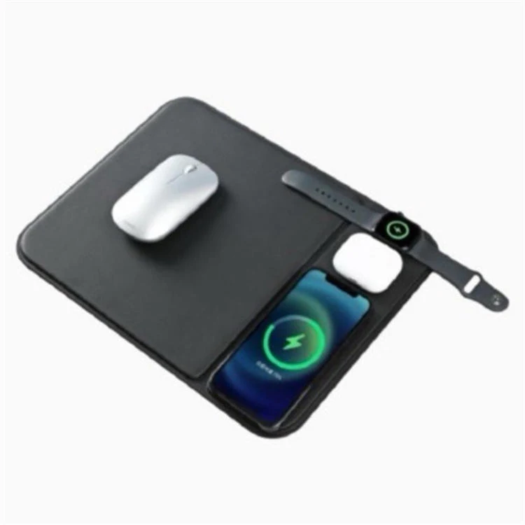 Mouse pad in use on an office desk with mouse and phone