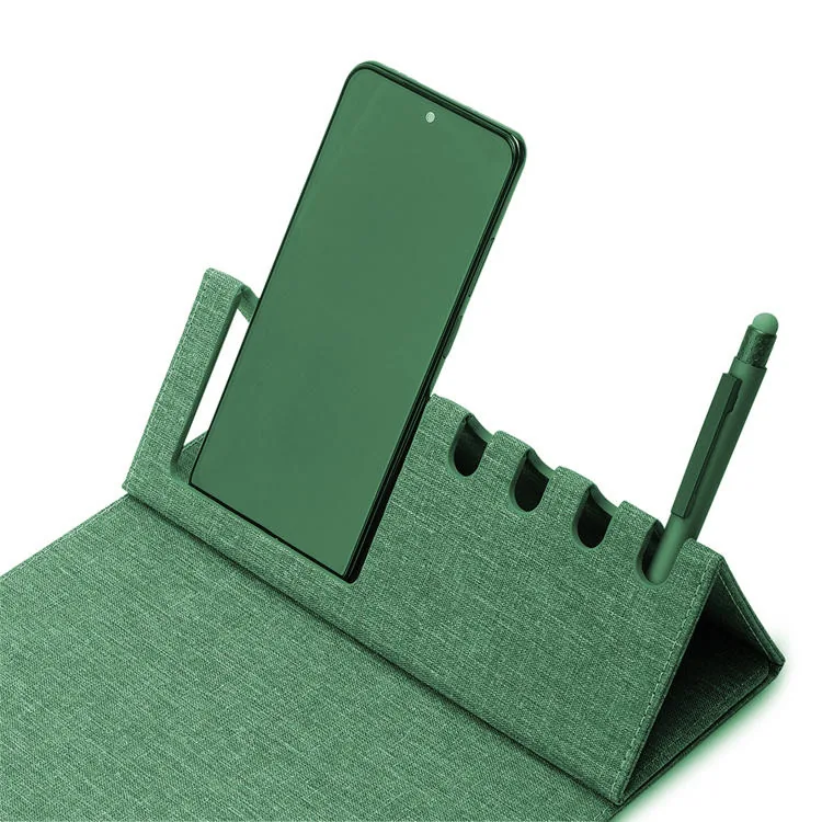 Black desk mat shown flat on an office desk