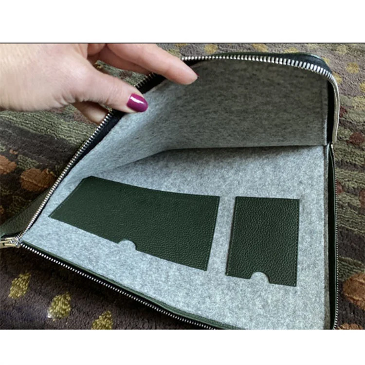 Dark green colourway of the leather device pouch