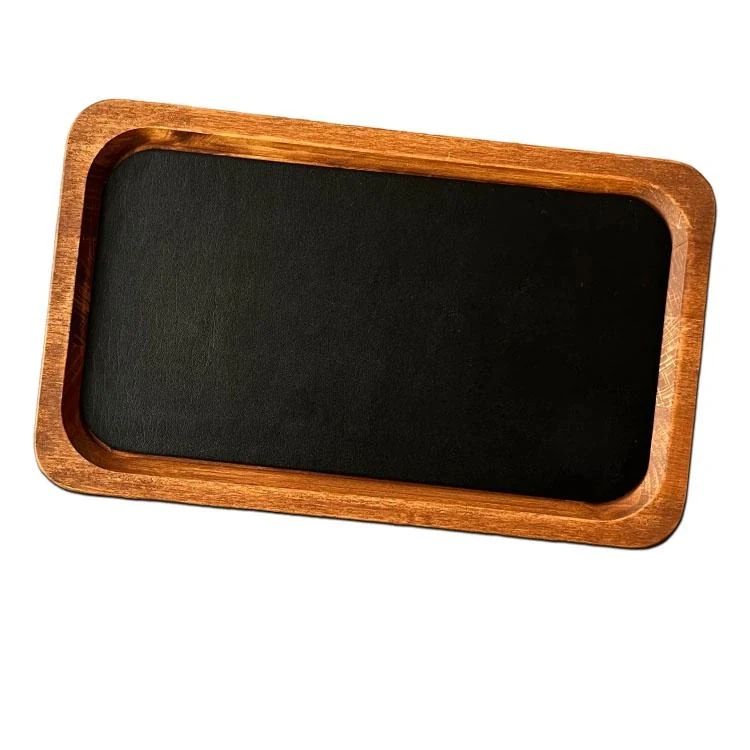 Set of wooden trays with black, blue and yellow leather linings