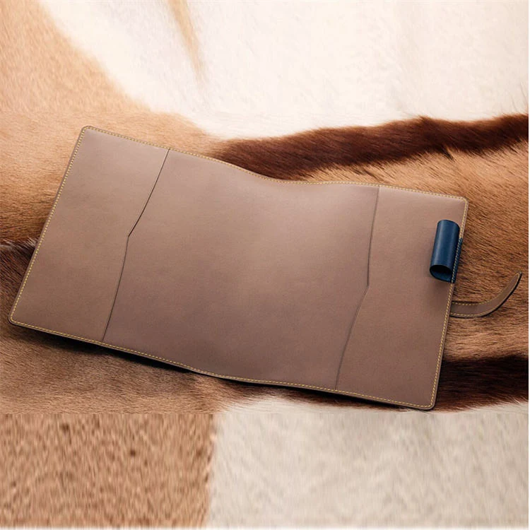 Cover open showing the pen loop and inner slots