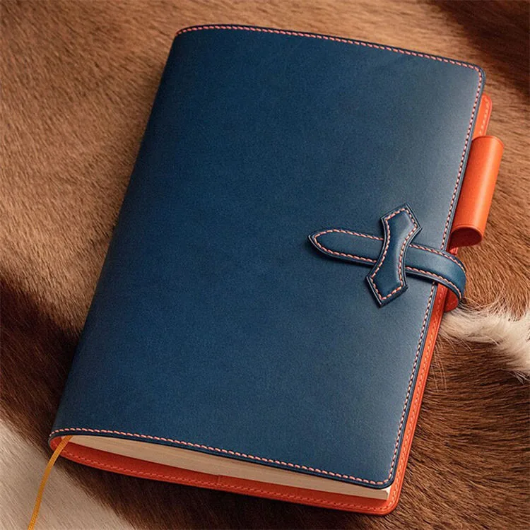 Notebook cover shown closed with the buckle fastened