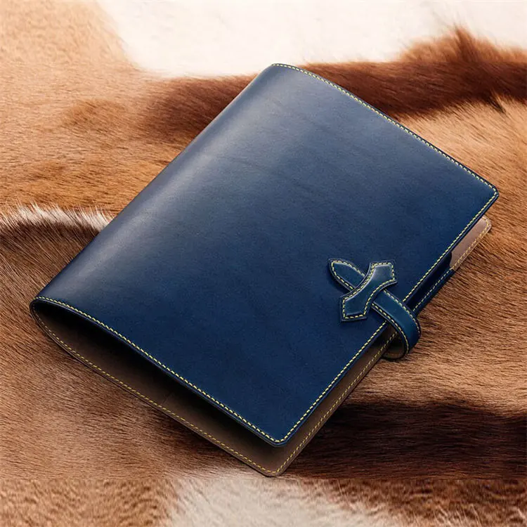 Close-up of the X-shaped leather buckle detail