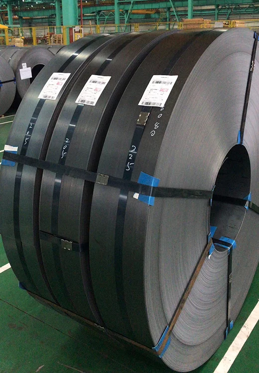 strapped slit steel coils with tags standing on a mill floor
