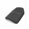 curved gray body armor plate photographed at an angle