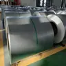 Spangled galvanized steel coil close up in a warehouse
