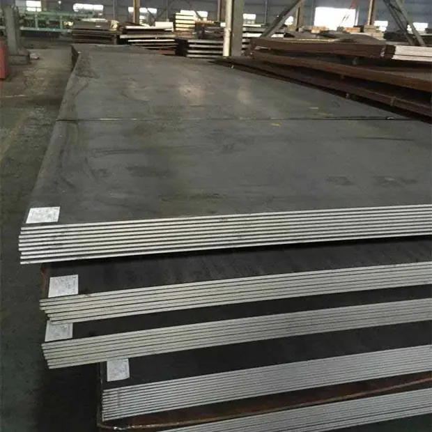 large steel plates stacked flat with bright sheared edges in a warehouse