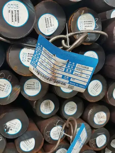 bundled round steel bar ends with white identification labels