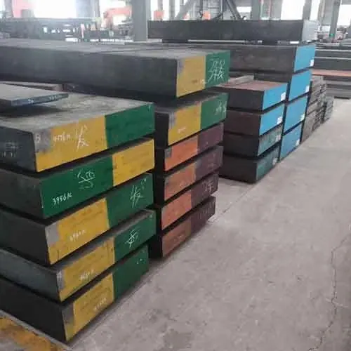 Stacked rectangular steel blocks with painted colored ends indoors