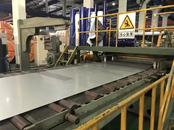 Steel sheets moving along a roller conveyor on a production line