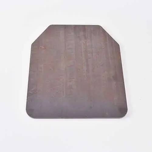 Bare steel armor plate blank with cut corners and light rust