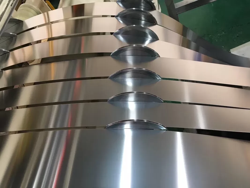 Close-up of tightly wound bright slit steel strip coils