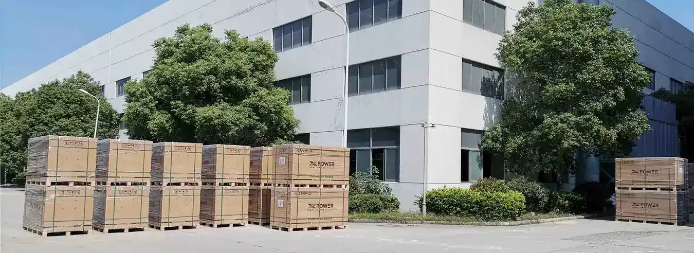 Export crates of PV modules stacked in the factory yard
