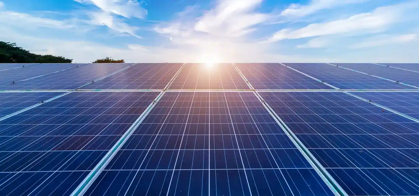 Ground-mounted PV array catching direct sunrise light