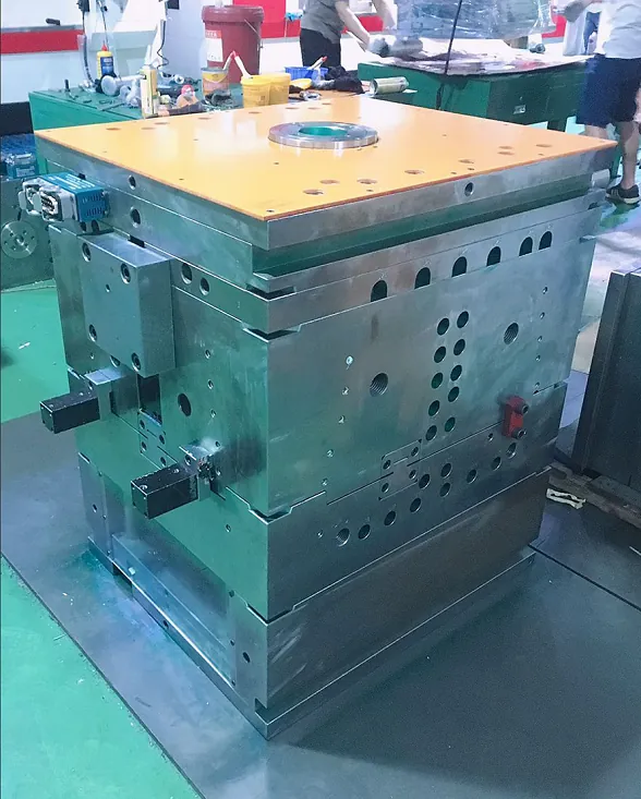 Injection mould with orange top clamping plate and ejector mechanism assembled for trial