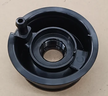 Black moulded cap with an internal moulded thread and vent spout, unscrewing mould part