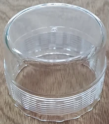 Transparent moulded cup with fine external ribs, produced in a polished clear tool
