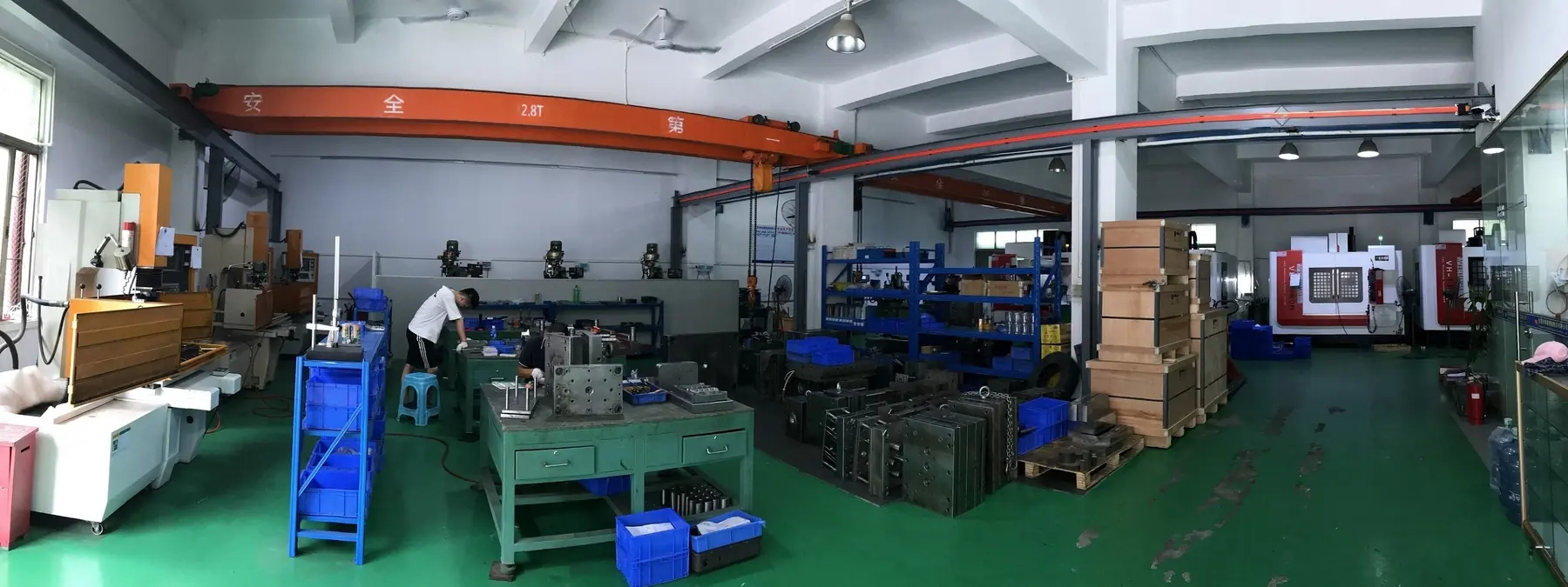 TJ-Teck toolroom with mold benches, steel tools, and a 2.8T overhead crane