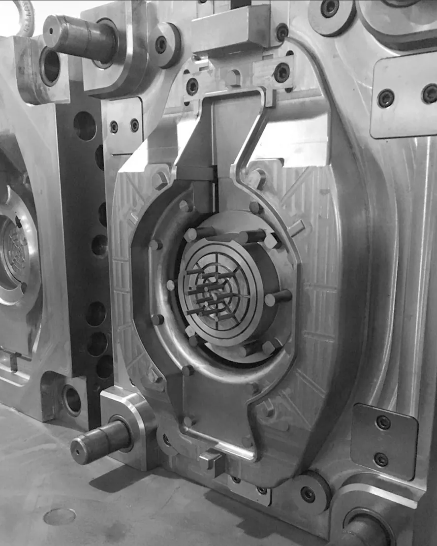Steel mold cavity with a round core and pins