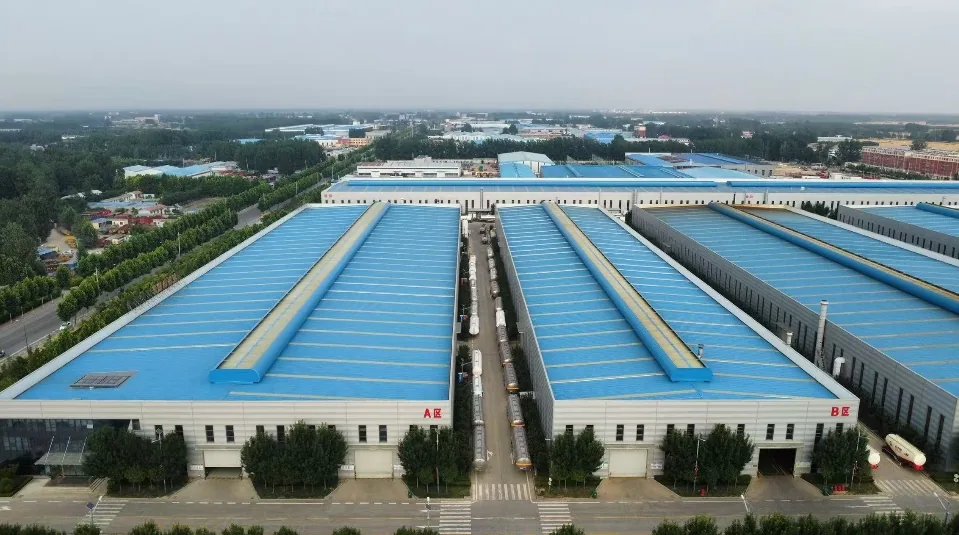 Aerial view of the SINOHENG factory site showing the tank trailer assembly buildings