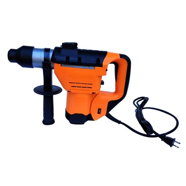 Drill in use with a hand applying pressure on a concrete surface