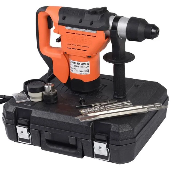 Orange rotary hammer drill with SDS bits, chisels and chuck adapter displayed on black hard carrying case.