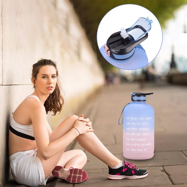 Detachable nylon straw and cleaning brush laid beside the sports bucket
