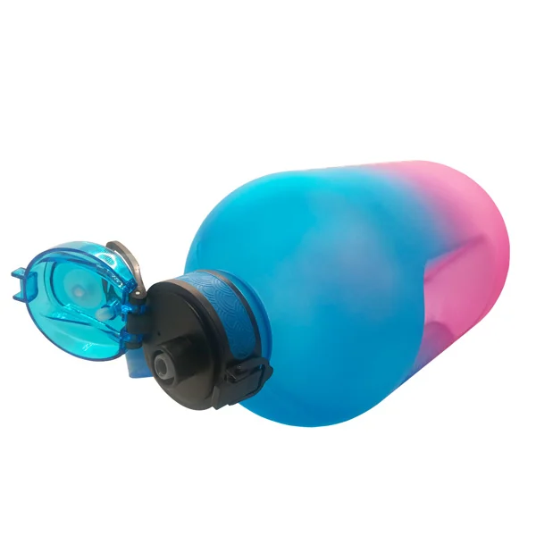 Water bottle placed next to a gym bag and workout gear for lifestyle context