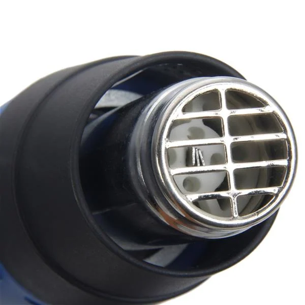 Close-up of a heat gun nozzle with chrome metal grille guard on a black housing