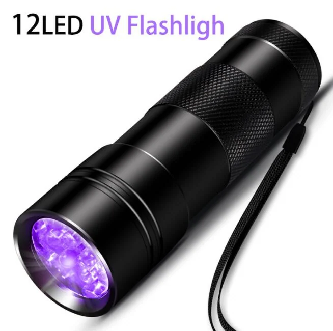 12-LED UV flashlight with aluminum alloy body, standing upright on a workbench