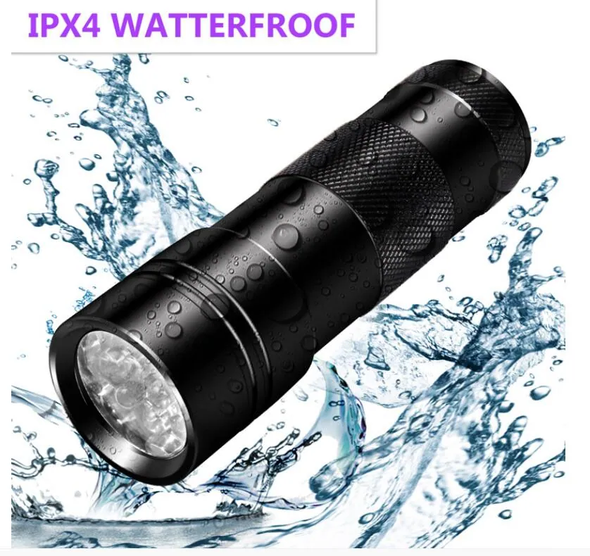 Black 12-LED UV flashlight angled among water
