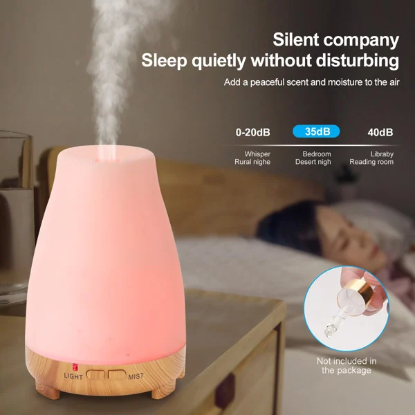 Remote control placed next to the diffuser on a bedroom dresser