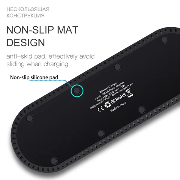 Charging mat placed on a desk with a smartphone, Apple Watch, and headphones in use