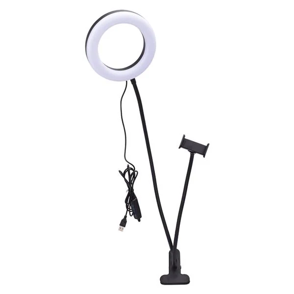 Clip base with rubber grip holding the light on a desk edge