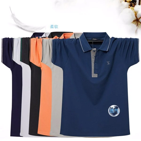 Fan of short sleeve polo shirts in navy, orange, grey and white with a dark blue polo shirt displayed in front