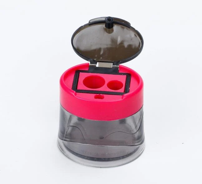 Close-up of the two sharpening holes and smooth outer surface of the pencil sharpener