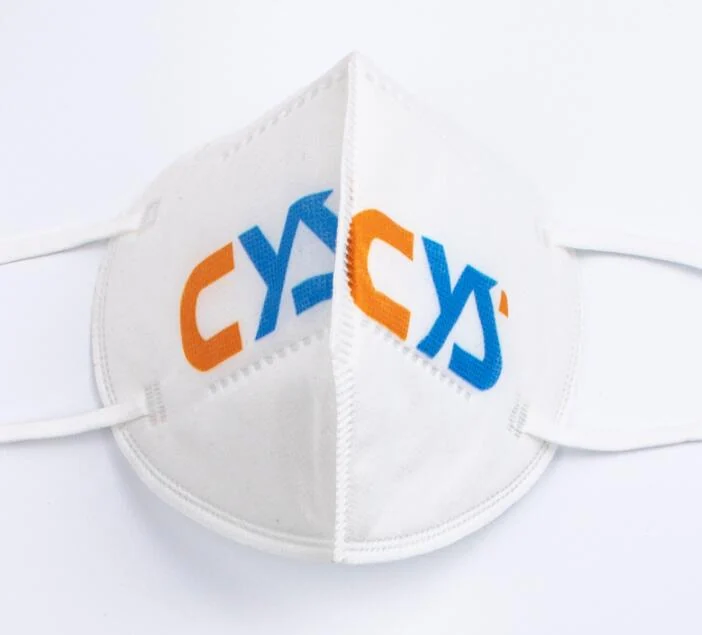 Mask in use on a person's face, showing fit around the nose and cheeks