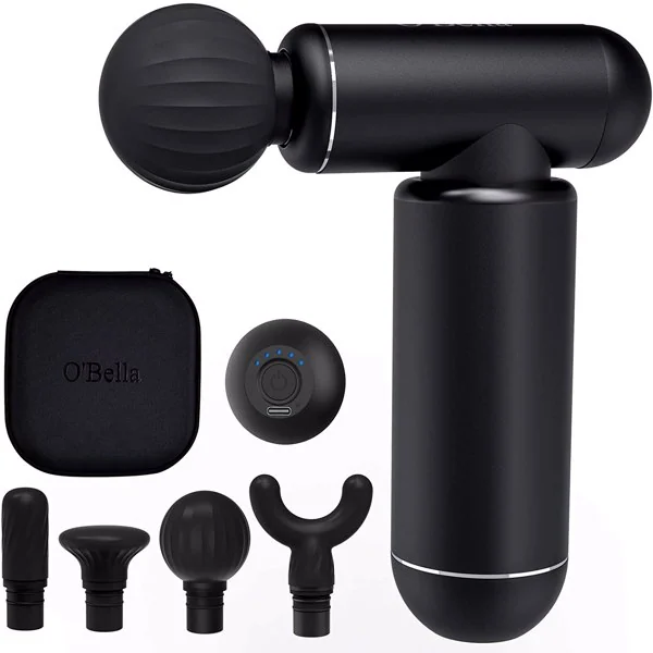 Black percussion massage gun with four attachment heads, round zippered carrying case and charger on white background