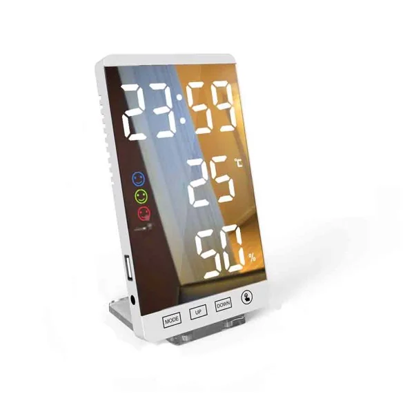 White digital LED mirror alarm clock showing 23:59, 25°C temperature and 50% humidity, on white background