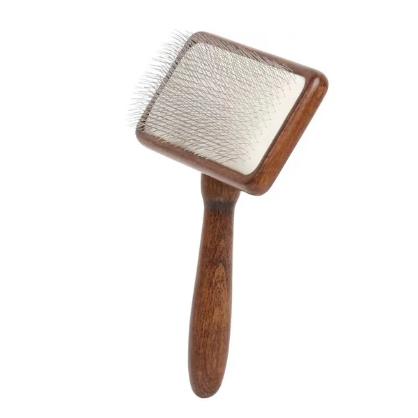 Side view of the brush showing the flat head and wooden handle