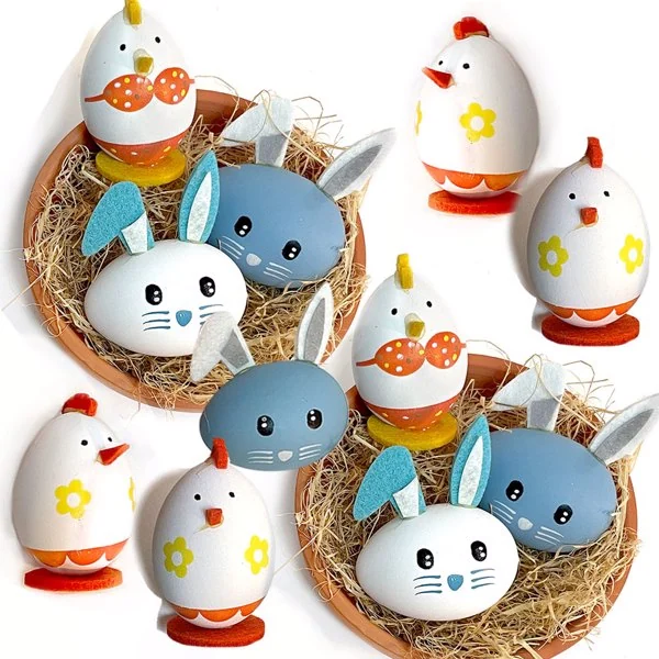 Painted Easter eggs decorated as bunnies and