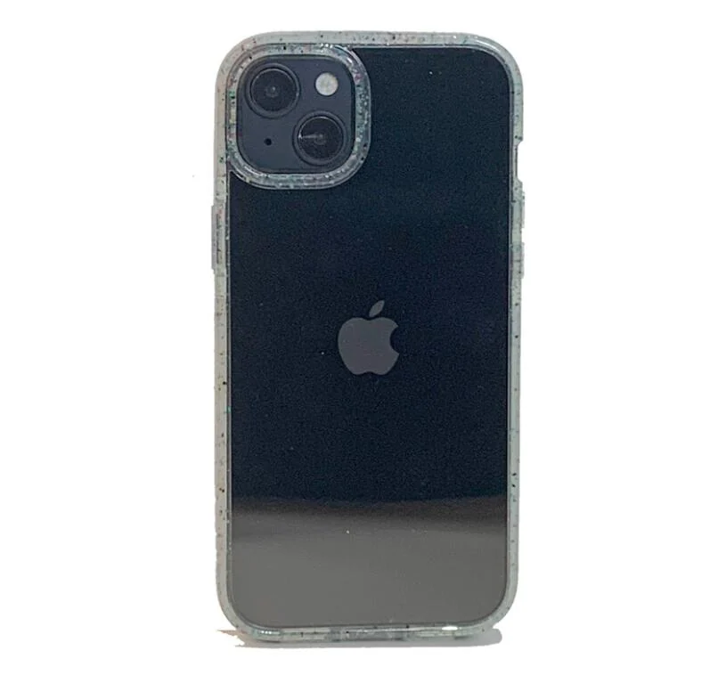 Transparent glitter phone case fitted on the back of a black Apple iPhone, showing camera cutout.