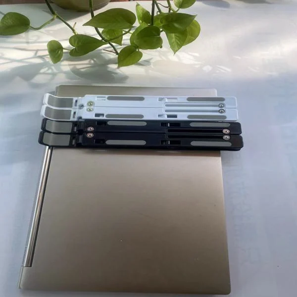 laptop stand with logo decoration visible on the surface
